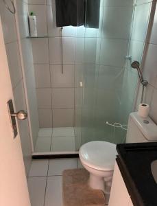 a bathroom with a shower and a toilet at Flat em Gravatá in Gravatá +5 photos