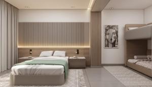 a bedroom with a large bed and a couch at Flow Aqua Legends Resort Sahl Hasheesh in Hurghada +59 photos