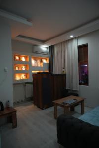 a living room with a couch and a table at BDK hotel in Istanbul