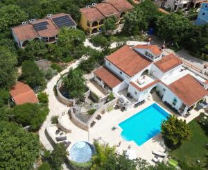 an aerial view of a house with a swimming pool at Appartment house Zara in Brzac