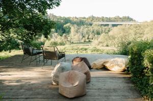 a group of people sleeping in bags on a patio at Kestrel lodge in Wrexham +16 photos