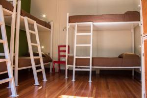 Cama ou camas em um quarto em Hostal Providencia
