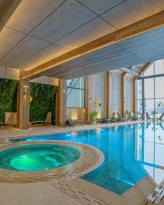 a large swimming pool in a hotel room at Zlatibor 2 in Zlatibor