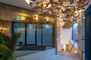 a view of the front of a town house with a chandelier at King Street Townhouse Hotel & Spa in Manchester