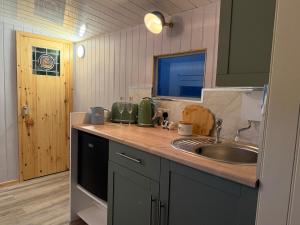 a kitchen with a sink and a counter top at The Truck in Longframlington