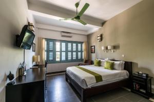 Letto o letti in una camera di The Columns