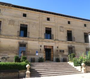 a stone building with stairs in front of it at Palacio de Sansol in Sansol