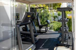 a gym with treadmills and elliptical machines at Pazziella, a Luxury Collection Hotel, Capri in Capri