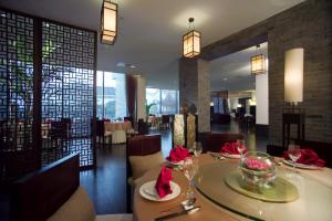 A restaurant or other place to eat at Garden Hotel Suzhou