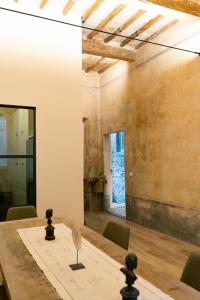 a dining room with a table and chairs at San Giacomo Suites in Città di Castello +103 photos