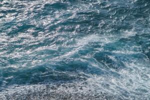 a large body of water with waves in it at Barreirinha II Near Old Town With Nice Ocean Views in Funchal