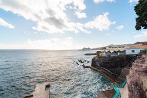 a view of the ocean from a cliff at Barreirinha II Near Old Town With Nice Ocean Views in Funchal +44 photos