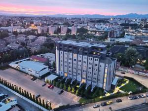 an aerial view of a large building in a city at Open Space - Garden & Jacuzzi in Milan