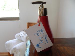 Postel nebo postele na pokoji v ubytování Umawtu Bed and Wine