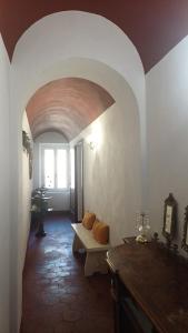 a living room with a couch and a window at la Ciccinina in Sarteano +64 photos