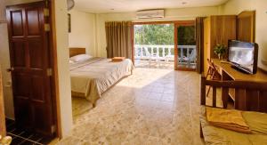 Ένα ή περισσότερα κρεβάτια σε δωμάτιο στο Hugs Guesthouse +10 φωτογραφίες