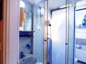 a bathroom with a sink and a shower at Villa Kristal Hotel in Budapest +113 photos