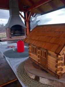 a wooden bird house sitting on top of a table at Resort Dudukovic 1 in Slunj