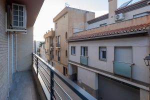 a view from the balcony of an apartment building at Piso Moredas in Dúrcal