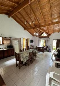 a kitchen and dining room with a table and chairs at OKIN 26 Unica in Costa del Este