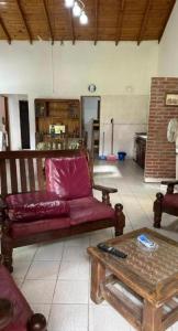 a living room with a couch and a table at OKIN 26 Unica in Costa del Este