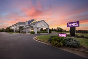 a rendering of a building with a parking lot at Spark by Hilton Bardstown in Bardstown