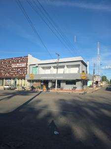 a building on the side of a street at Trilhas do Araguaia in Aruanã