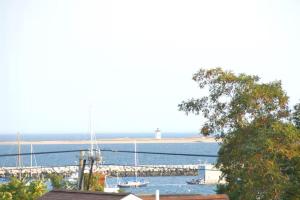 a view of a marina with boats in the water at High Tide Upper Level in Provincetown