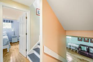 a room with a staircase and a room with a bedroom at Pleasant Point in Wellfleet +28 photos