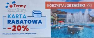a sign for a water park with a fountain at Noclegi Damianek in Nowy Targ