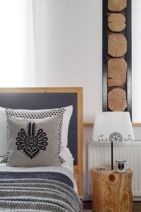 Posteľ alebo postele v izbe v ubytovaní Villa 11 Folk & Design