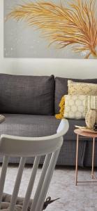 a living room with a couch and a table at Finca de Sal in Mazo