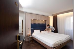 Posteľ alebo postele v izbe v ubytovaní Hotel Alexander Zurich Old Town