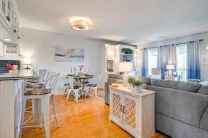 a living room with a couch and a table at Ocean Access & Balcony: Surfside Beach Condo in Myrtle Beach