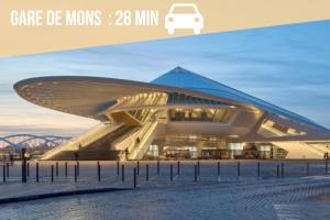 a picture of a building with a car on it at Le Château des Comtesses - Vue lac, 13 pers in Montignies-sur-Roc