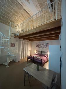 a bedroom with a bunk bed and a loft at Casa Vacanze Zia Concetta in Nardò