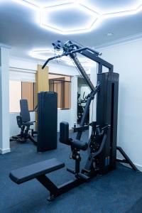 a room with a gym with two tread machines at Solay Inn in Ayacucho