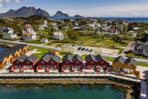 an aerial view of a town with houses at Skottinden Panorama Lofoten in Ballstad