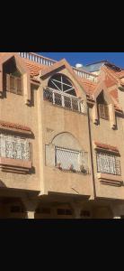 a building with two balconies on the side of it at Azrou in Azrou