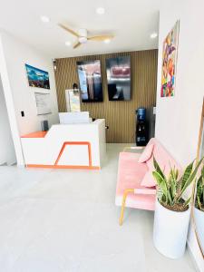 a living room with a couch and a table at NEW YORK by luxury atitlan in San Pedro La Laguna