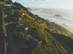 an aerial view of houses on a hill next to the ocean at Cabañas Mirador de Matanzas in Matanzas