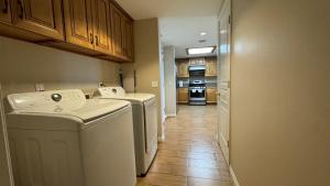 a kitchen with a washer and dryer in a room at Modern 2BD Apartment with 2 Baths in Alhambra in Alhambra