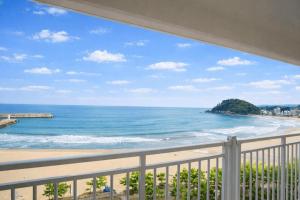 a view of the beach from a balcony at Yangyang Cohost Studio in Yangyang