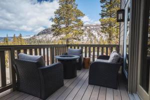 a balcony with chairs and a view of the mountains at Kirkwood Mountainside Cabin & Cottage Deck wViews in Kirkwood +70 photos