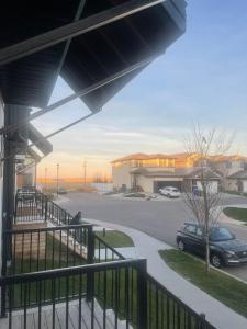 a view of a parking lot with a car at Ubbies place in Regina