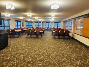 a large room with tables and chairs in it at Best Western Sault Ste. Marie in Sault Ste. Marie +30 photos
