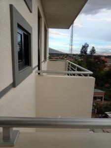 a balcony of a building with a window and a view at RoofTop in Kollpa