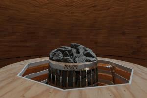 a pile of rocks sitting on top of a table at Sanamane in Naoshima