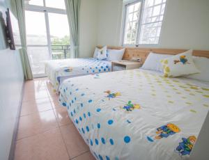 Letto o letti in una camera di Sally's Home