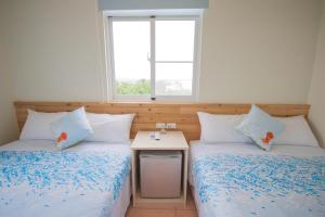 Letto o letti in una camera di Sally's Home